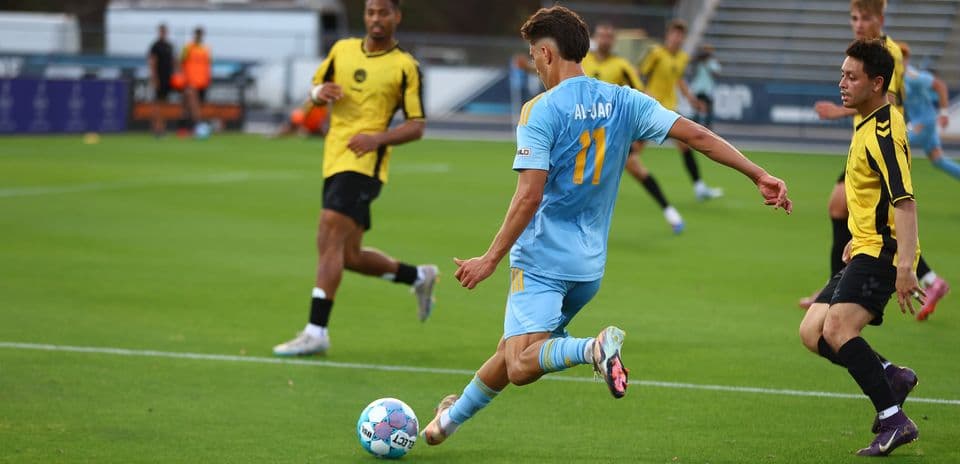 Player from JAX kicking the ball during match