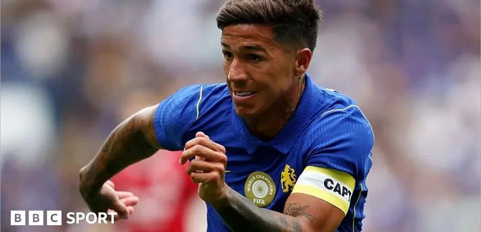 Player running with ball during football match