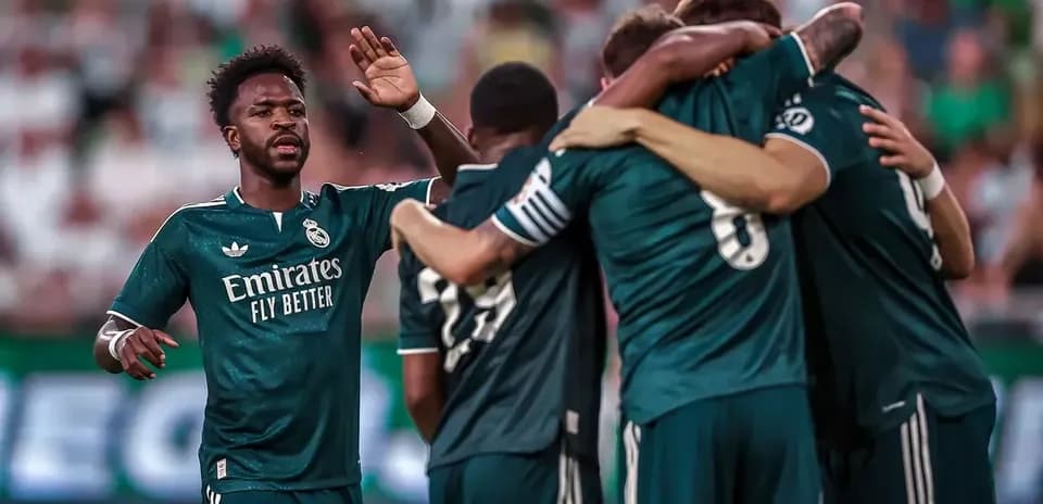 Real Madrid players celebrating a goal