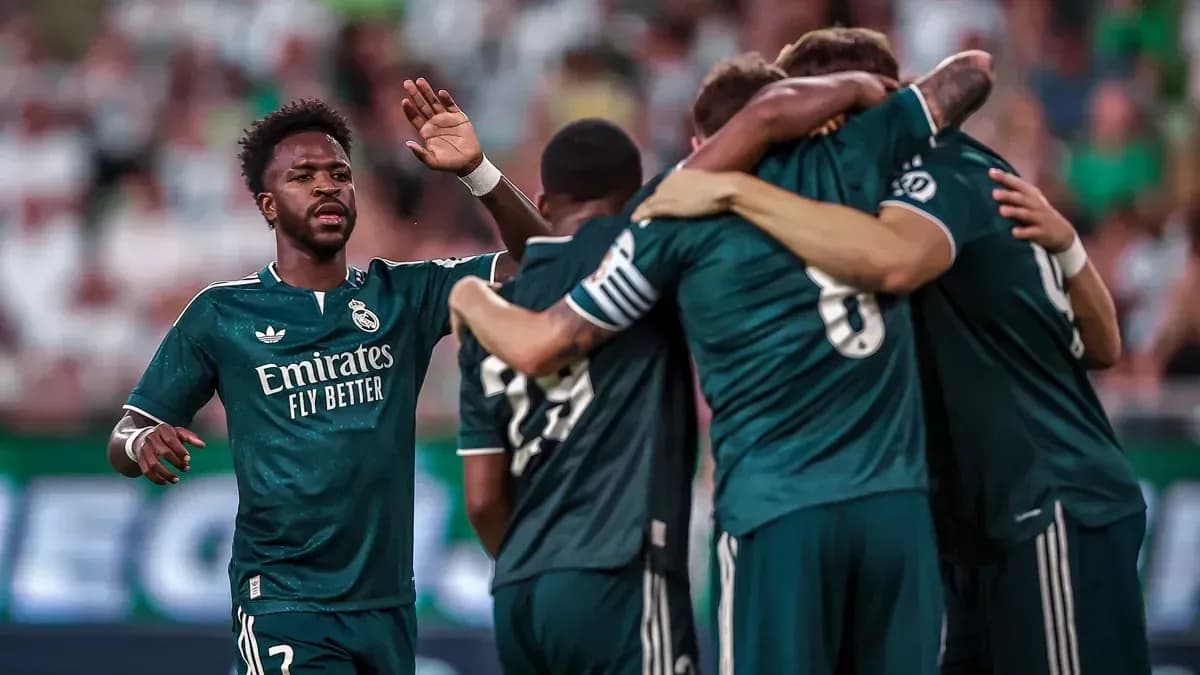 Real Madrid players celebrating a goal