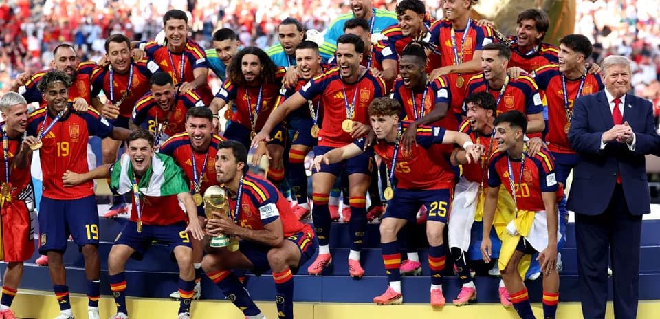 Spain national team celebrating World Cup victory on podium