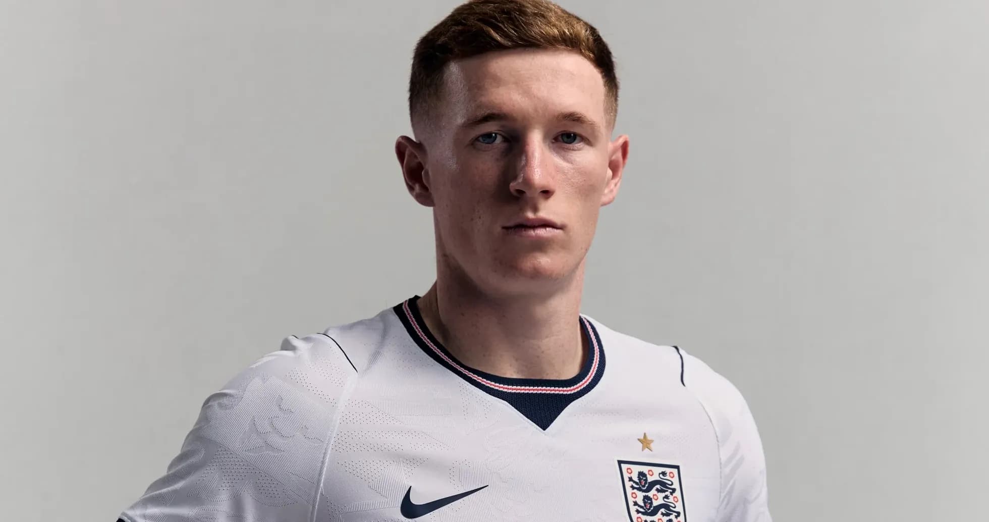 Player posing in England football kit