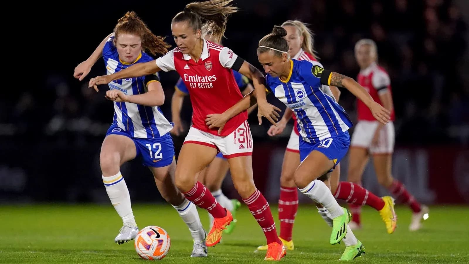 Brighton W players competing against Arsenal W