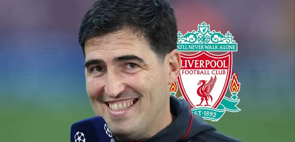 Person speaking into microphone with Liverpool logo in background
