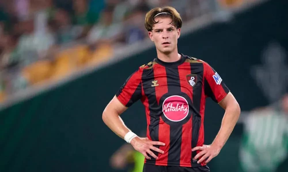 Player in Bournemouth kit on the pitch
