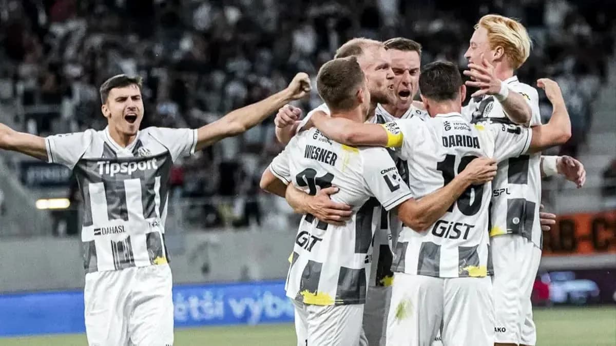 Players celebrating a goal during match