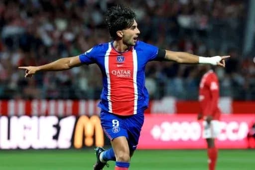 Player celebrating a goal for PSG during match
