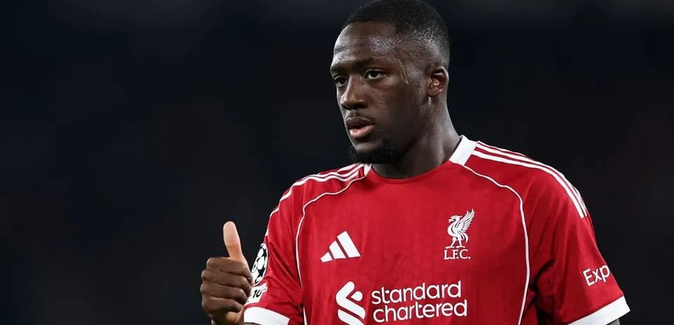 Player in Liverpool jersey giving thumbs up