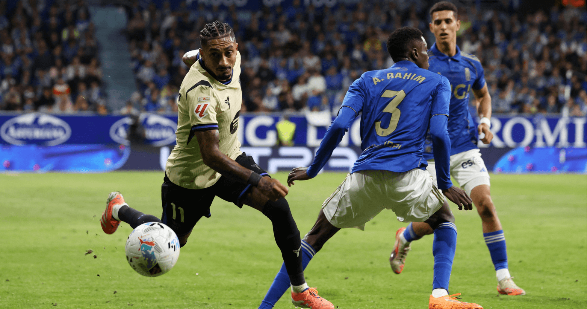 Player dribbling during Oviedo vs Alaves match
