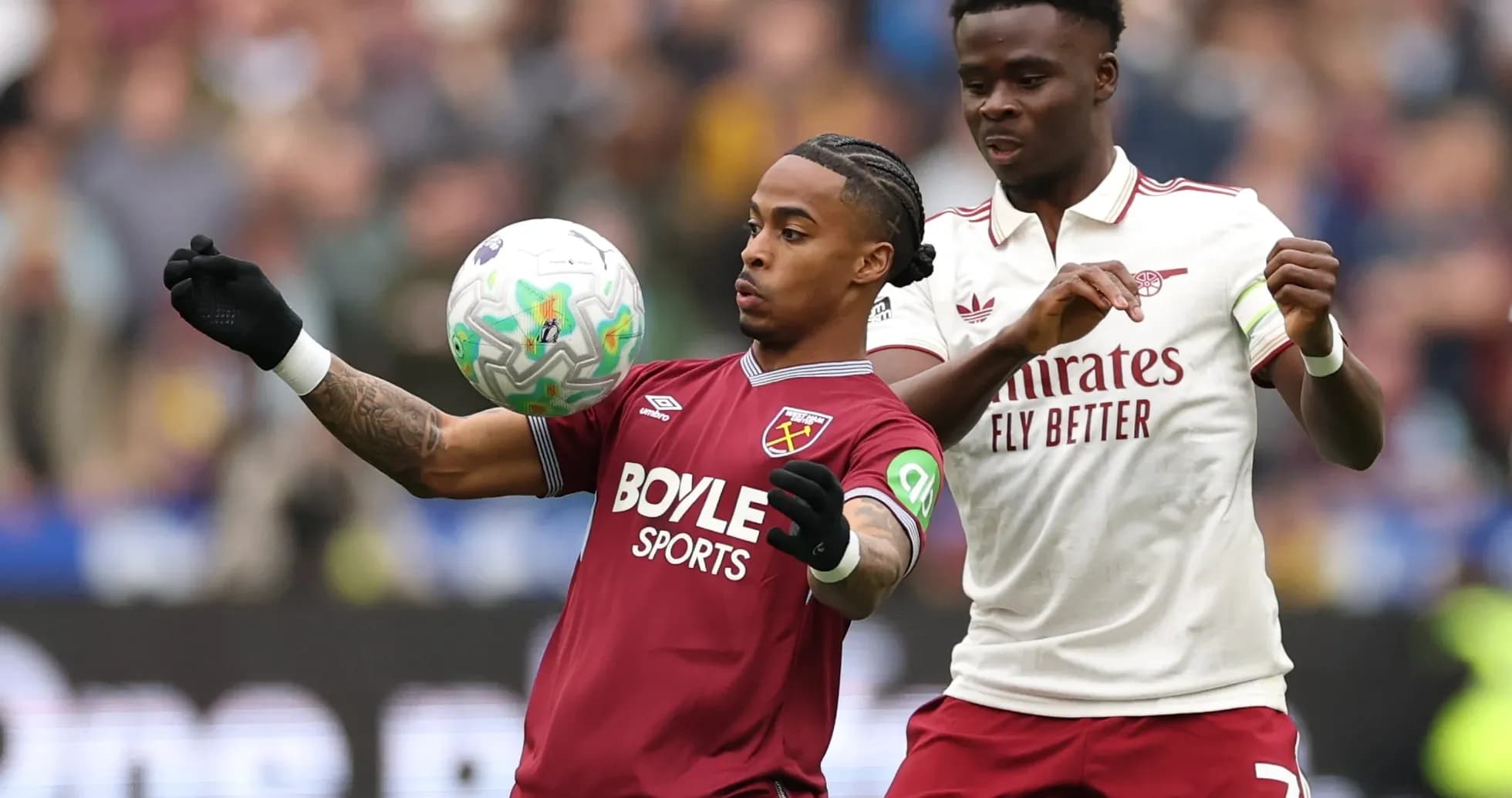 West Ham player controlling ball against Arsenal