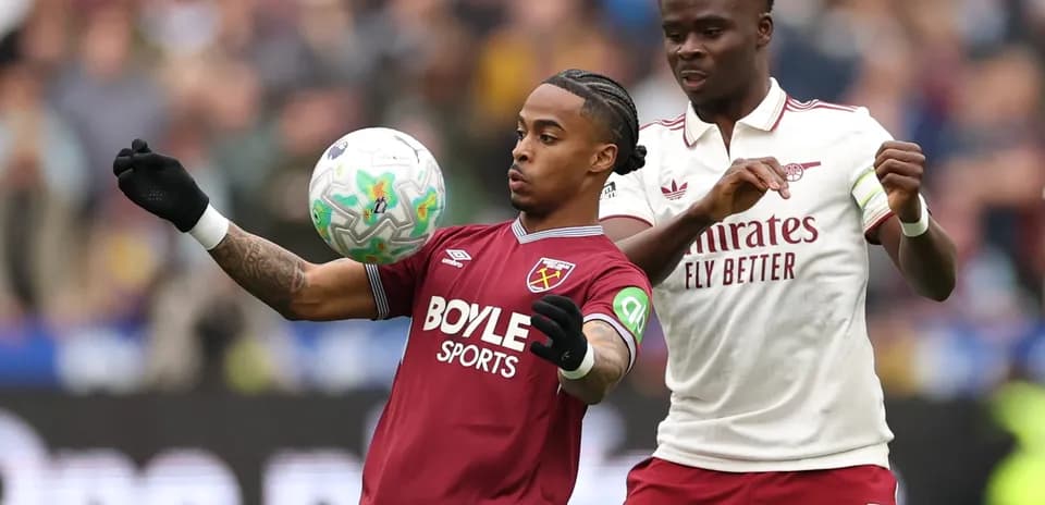 West Ham player controlling ball against Arsenal