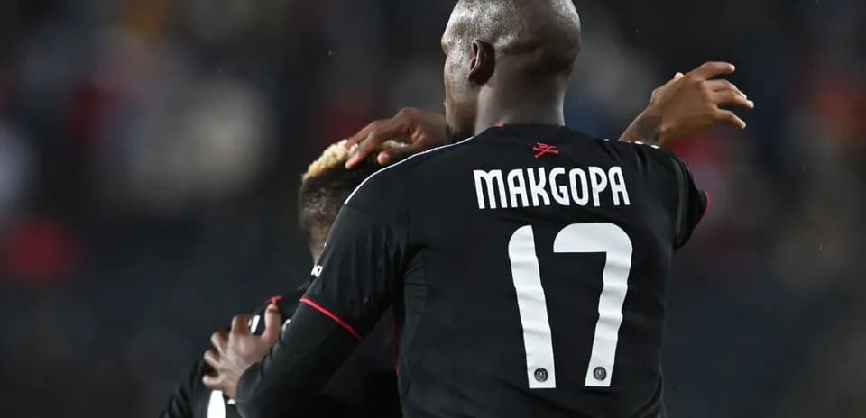 Players celebrating together on the field