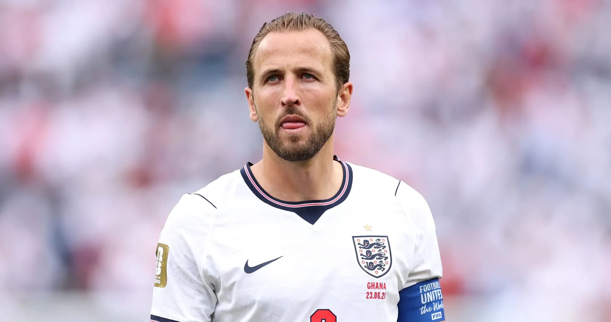 Player wearing England jersey during match preparation