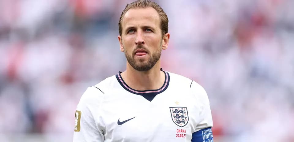 Player wearing England jersey during match preparation