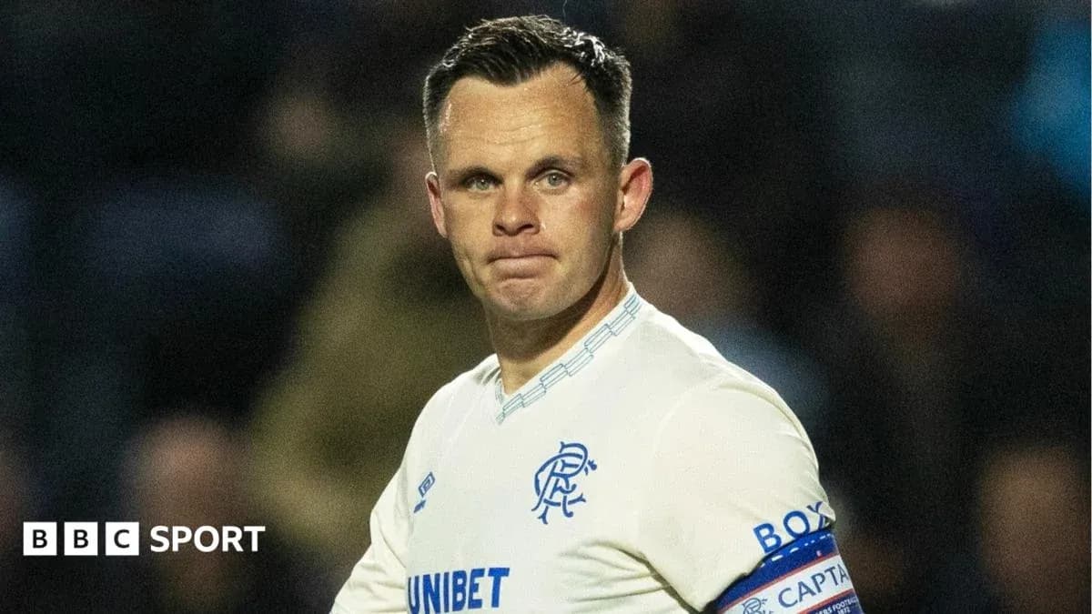 Player in Rangers kit during match action