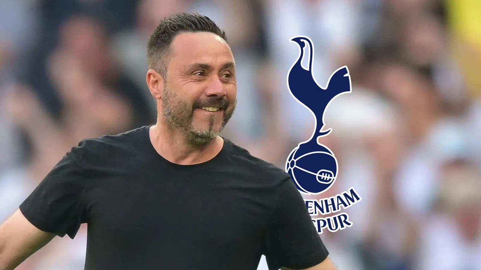 Manager celebrating with Tottenham Hotspur logo in background