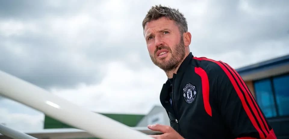 Manchester United coach looking towards the sky