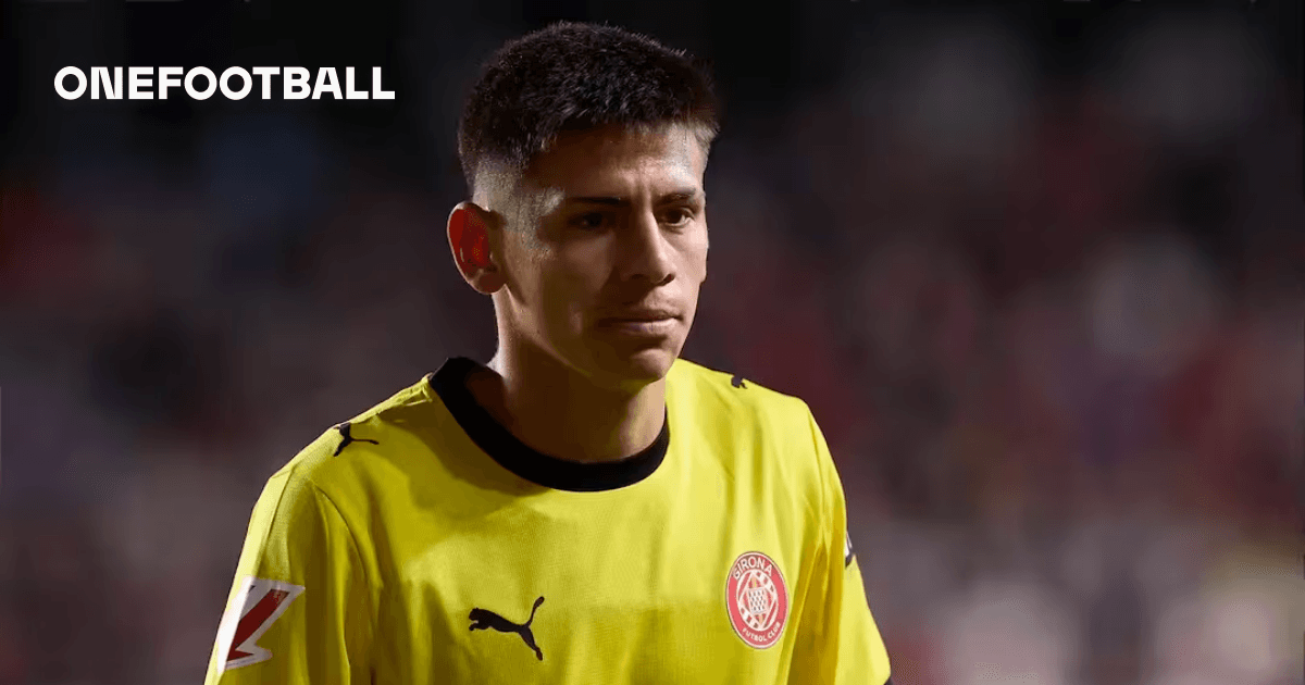 Goalkeeper wearing yellow kit walking off the field