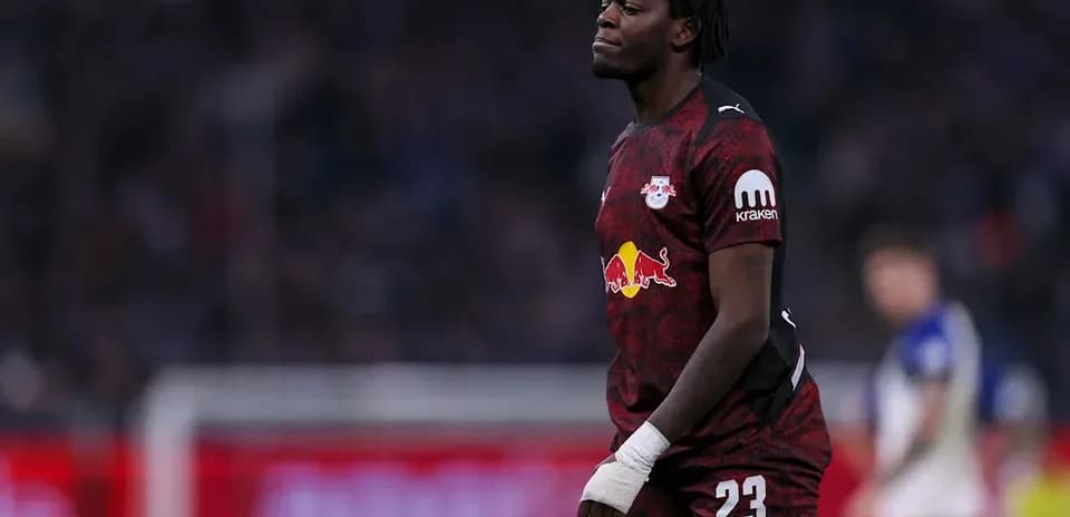 Player in RB Leipzig kit walking on the pitch