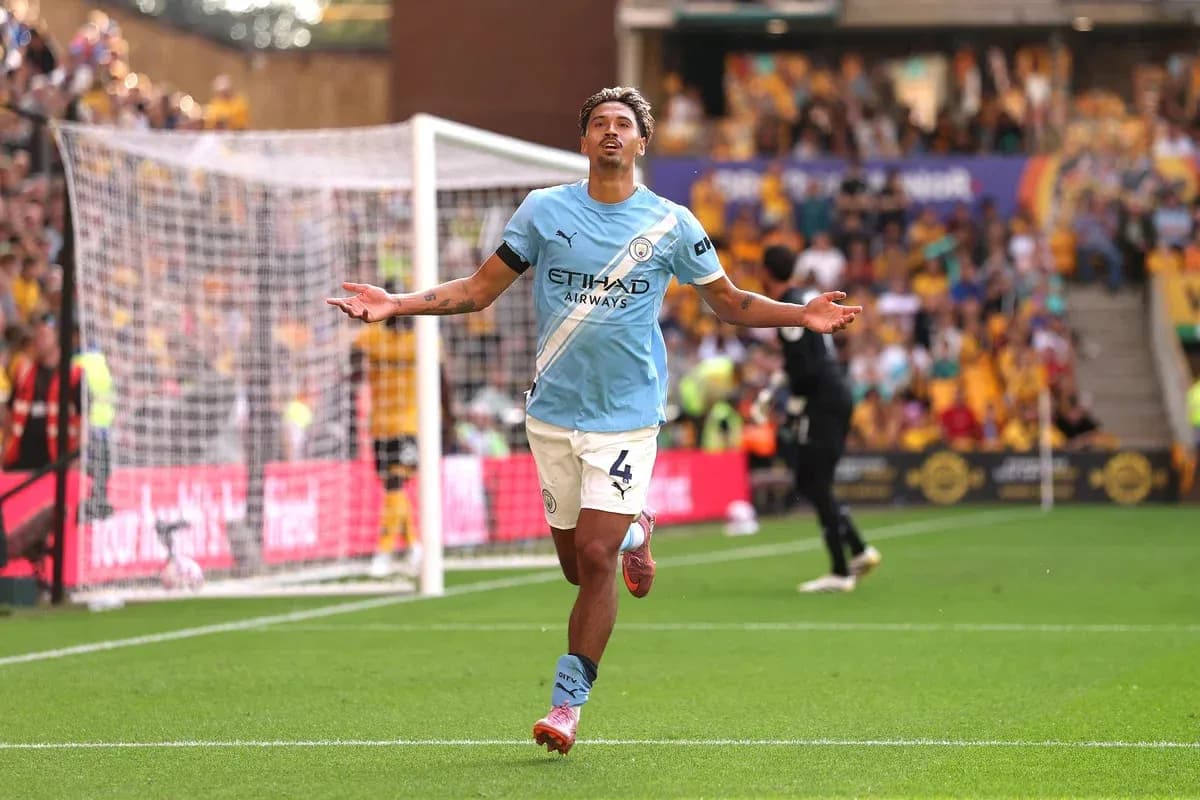 Player celebrating after scoring a goal for Manchester City