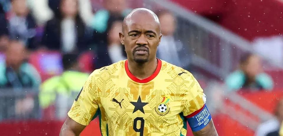 Ghanaian player wearing yellow jersey during match