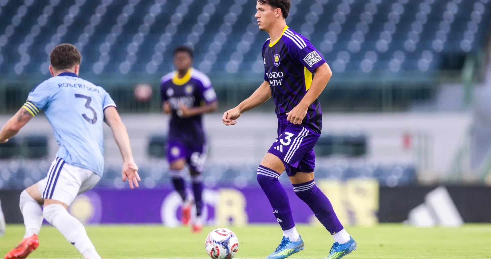 Orlando City II player dribbling the ball