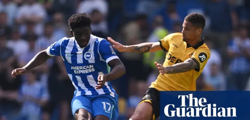 Brighton player dribbling past opponent during match