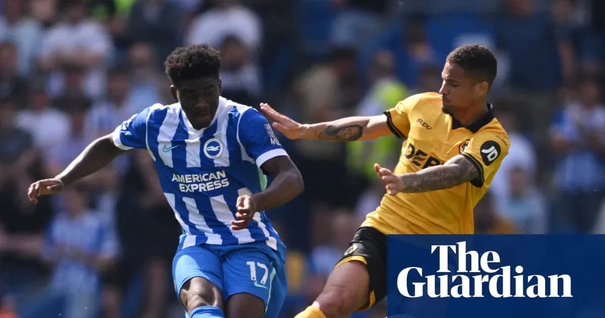 Brighton player dribbling past opponent during match