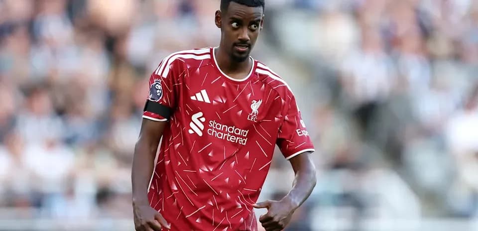 Player in red Liverpool kit during match