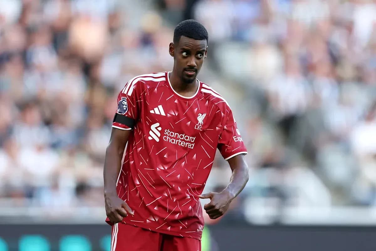 Player in red Liverpool kit during match