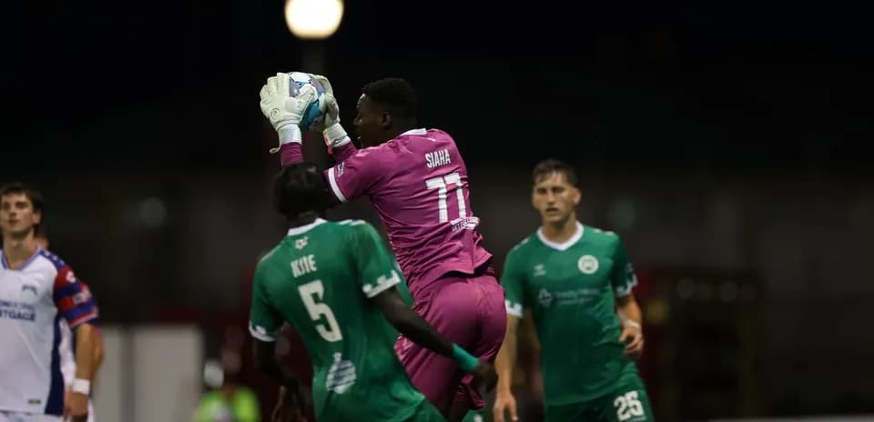 Goalkeeper catches ball during Tampa Bay Rowdies match