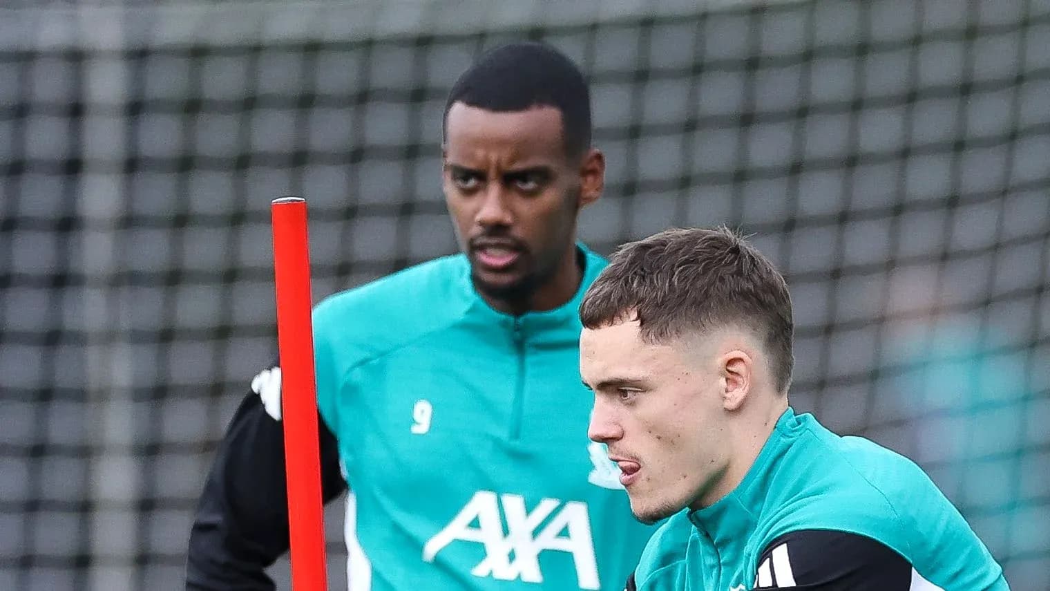 Two players during training session with equipment