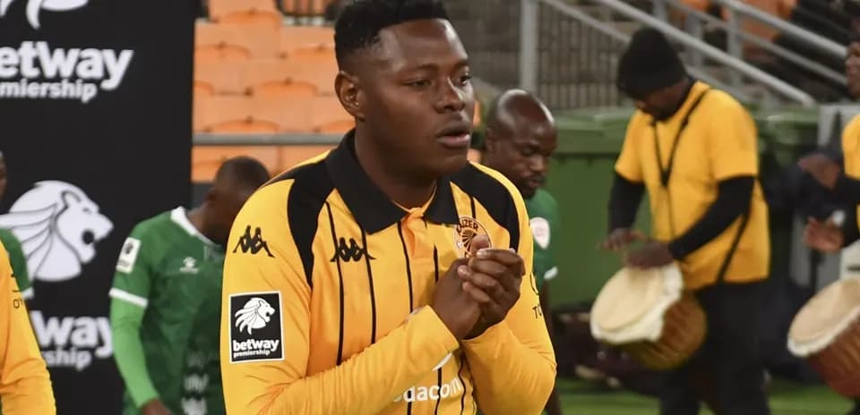 Player in yellow jersey preparing for match entrance