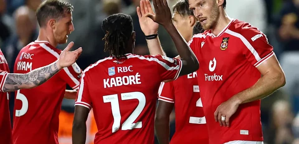 Players celebrating after scoring during a match