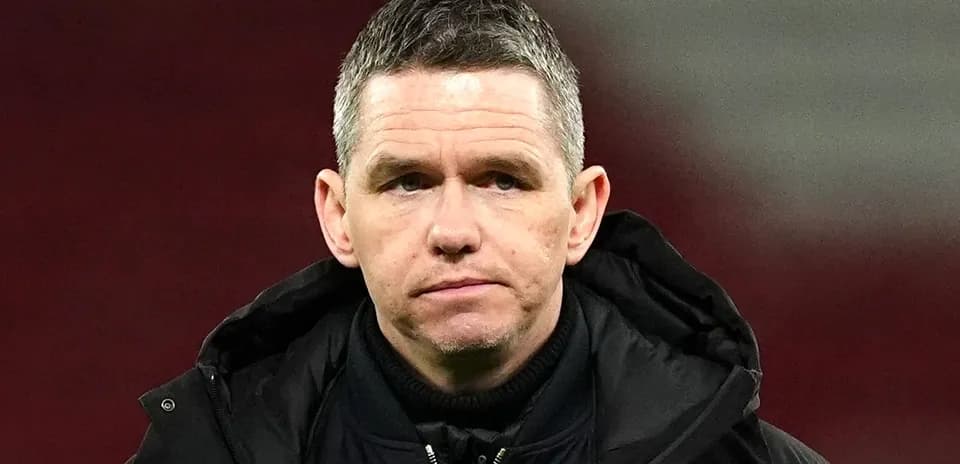 Coach observing during a football match