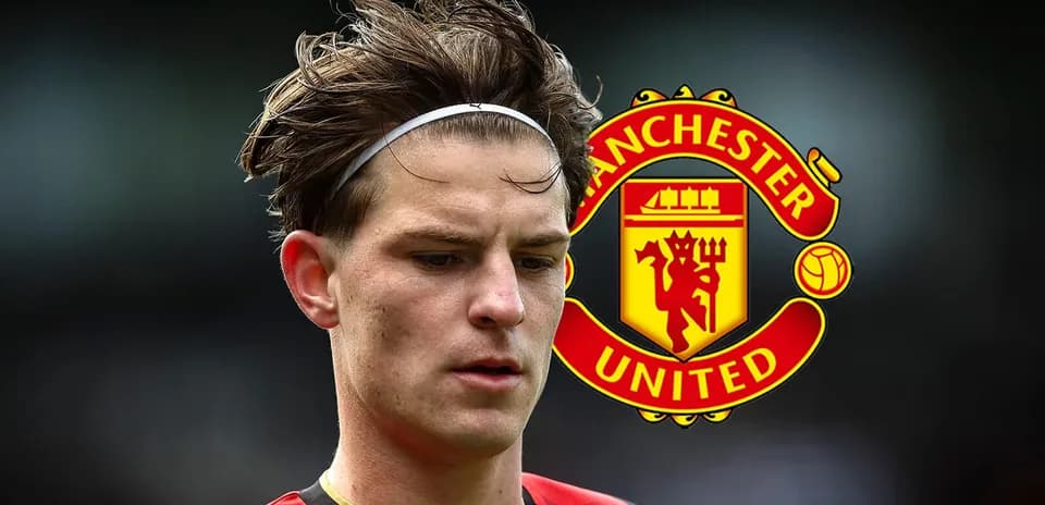 Player in headband with Manchester United logo background