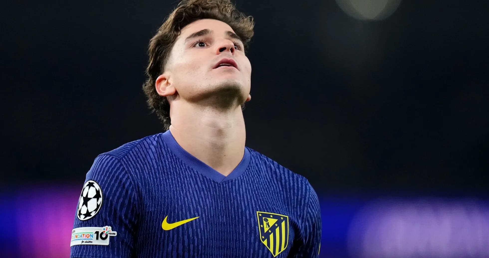 Player from Atlético Madrid looking upwards during match