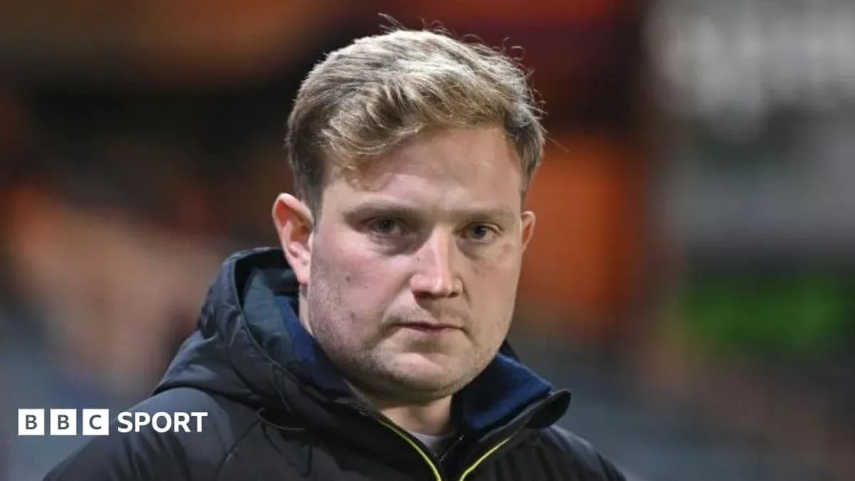 Coach looking serious during match preparation