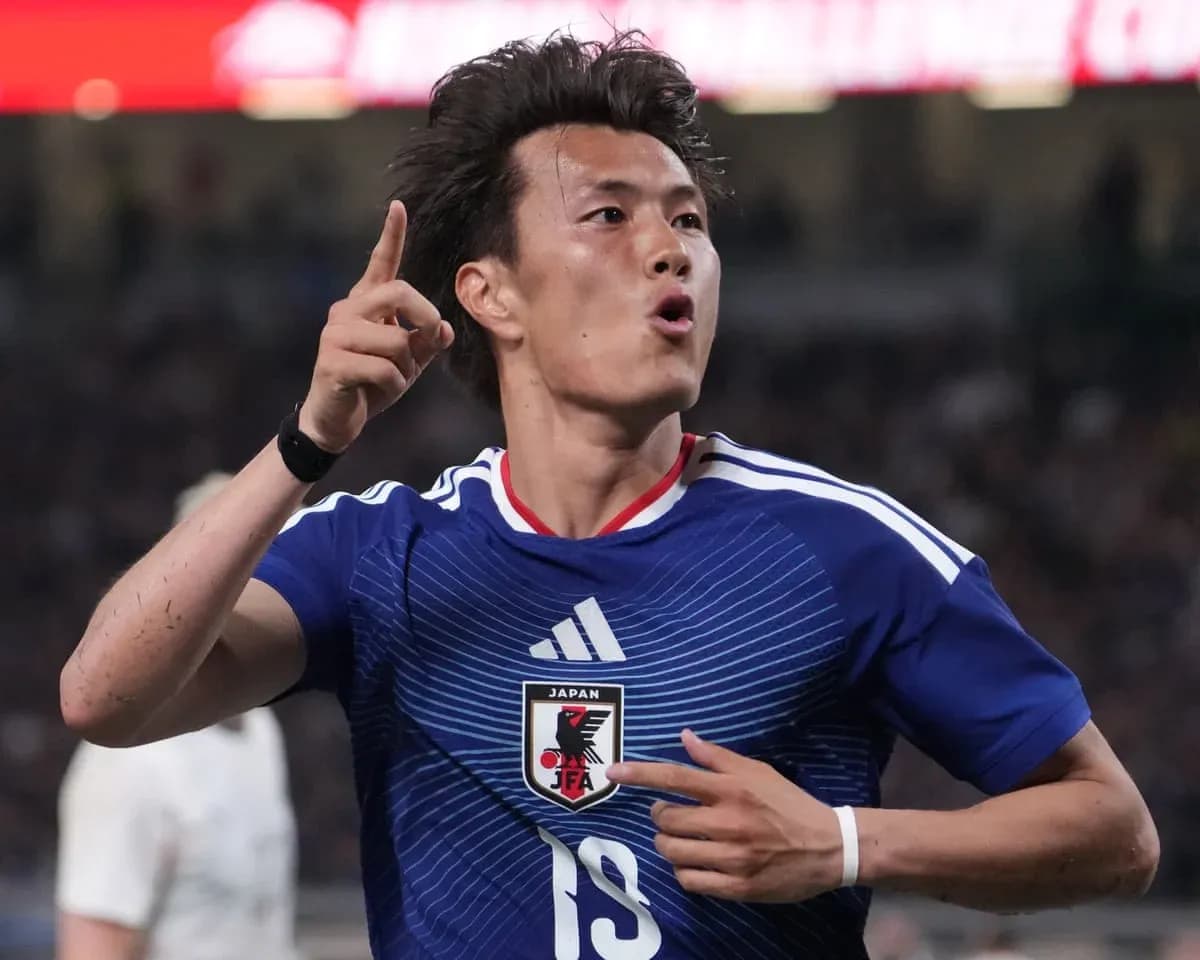 Japanese player celebrating during match against Netherlands