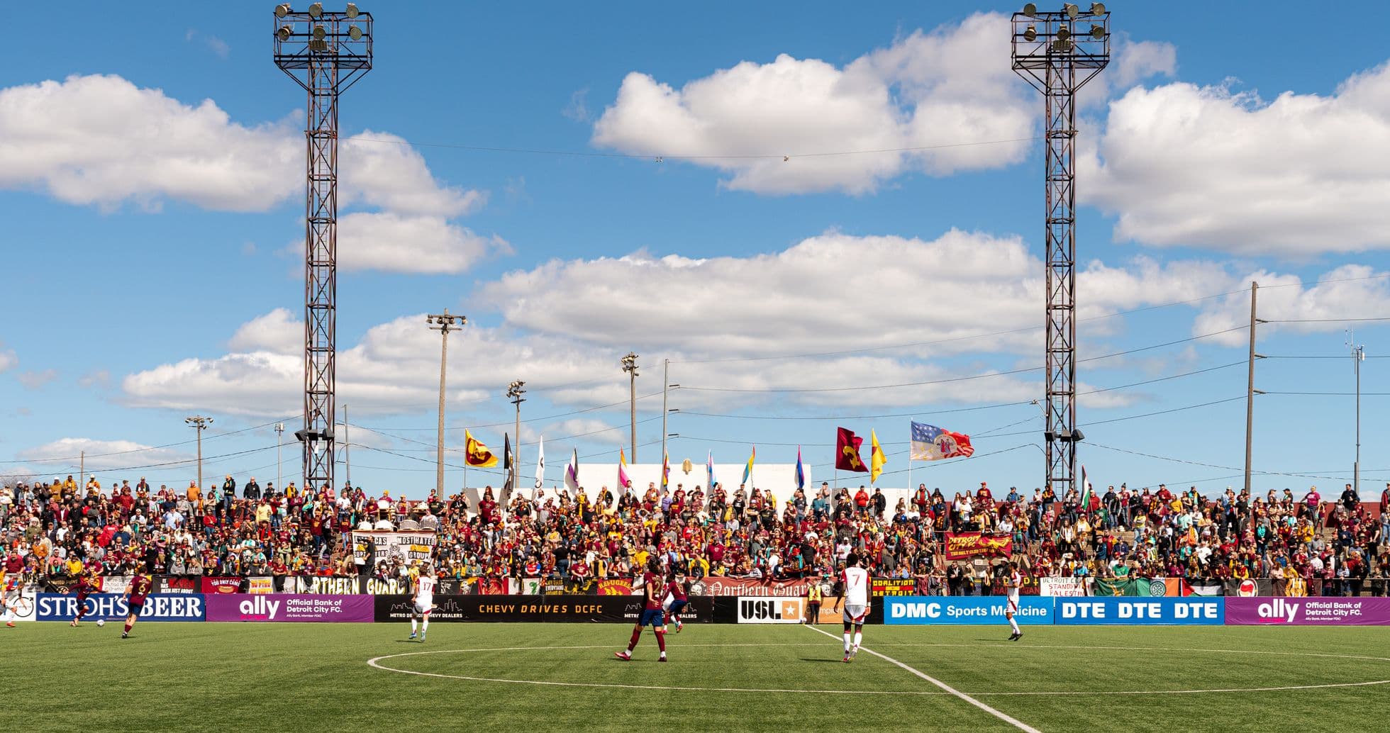Fans cheering during Detroit City match