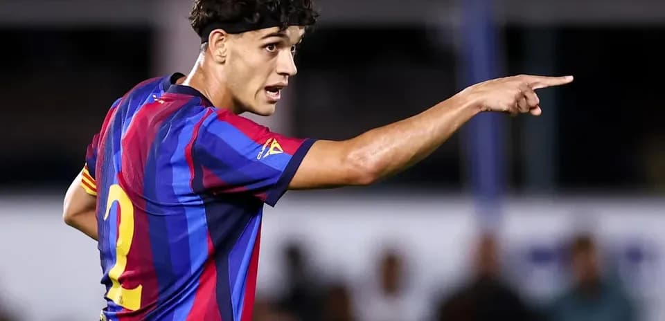 Player gesturing during match in Barcelona jersey