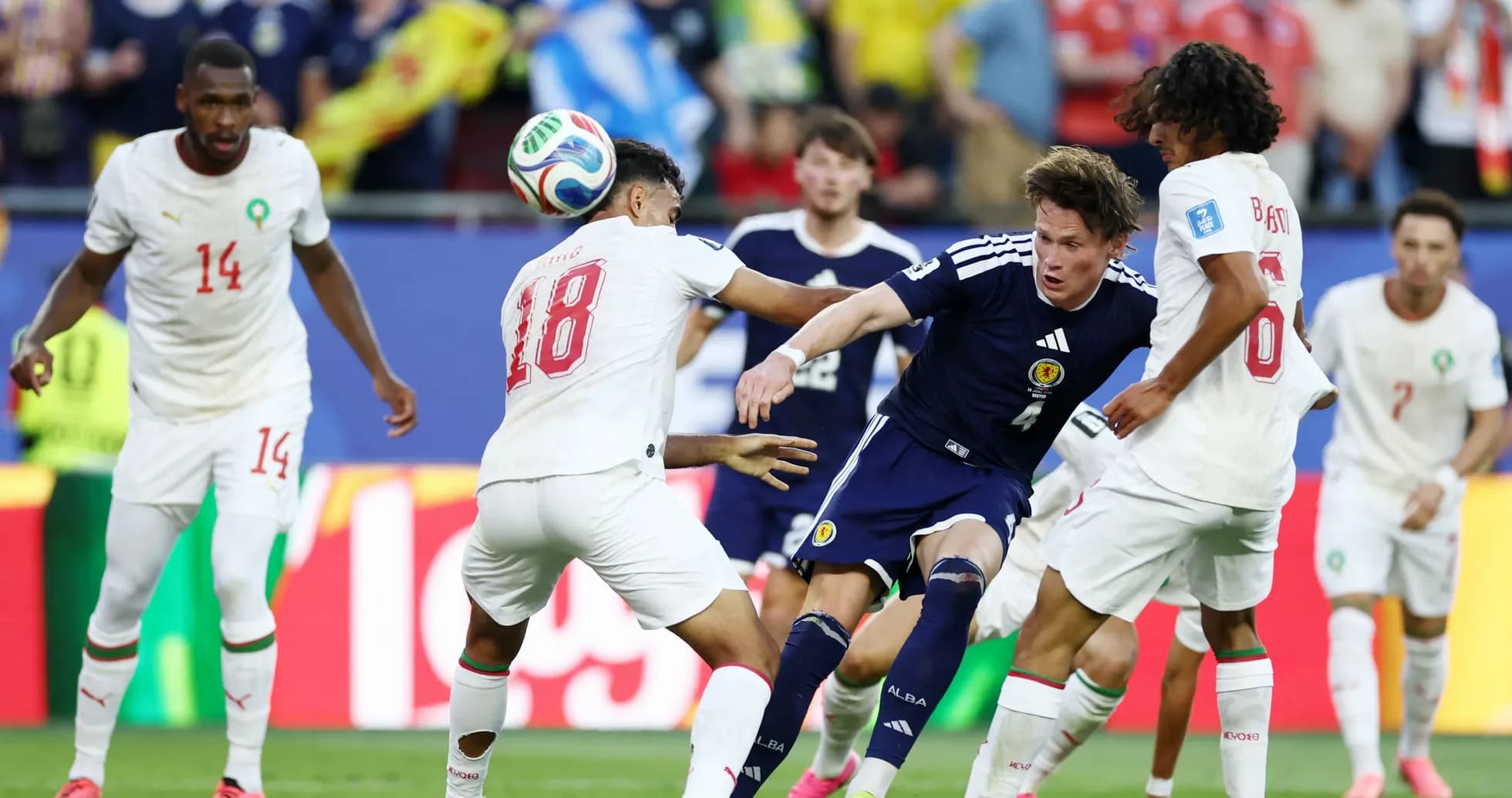 Players contesting for the ball during a match