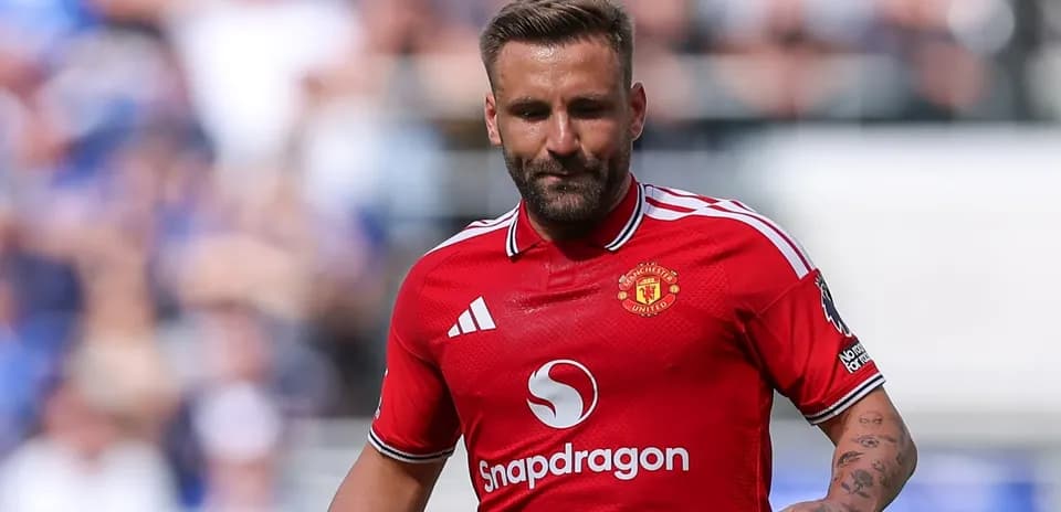 Player in red Manchester United jersey during match