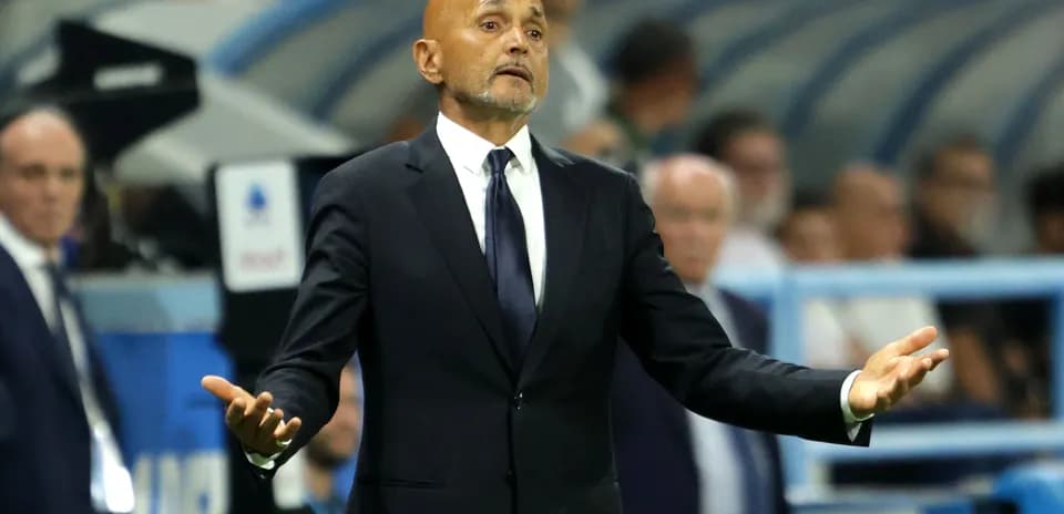Coach gesturing during a match on the sideline