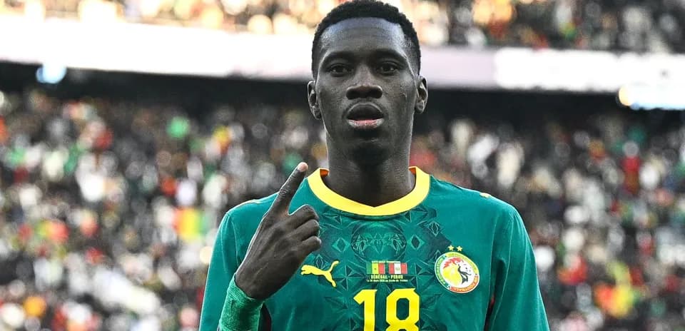 Player celebrating with finger raised during match