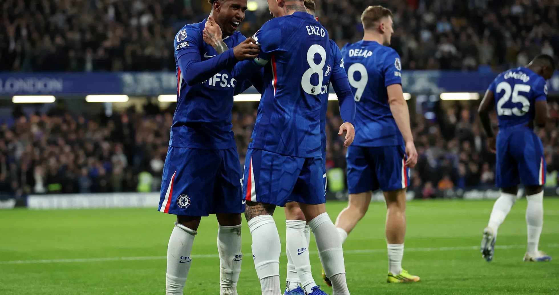 Chelsea players celebrating a goal during match