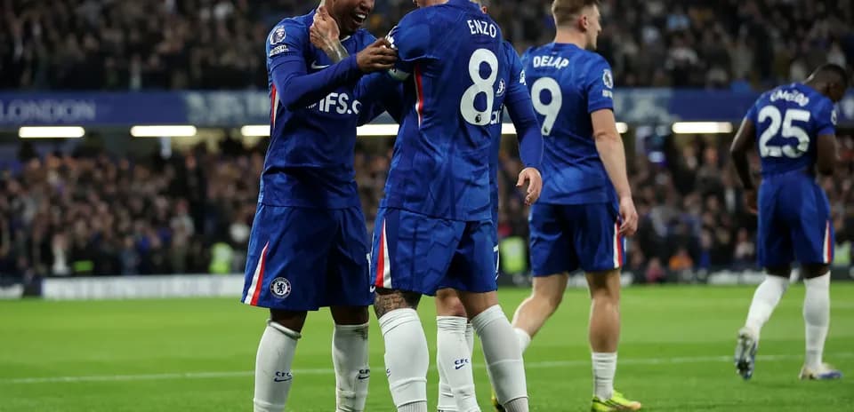 Chelsea players celebrating a goal during match