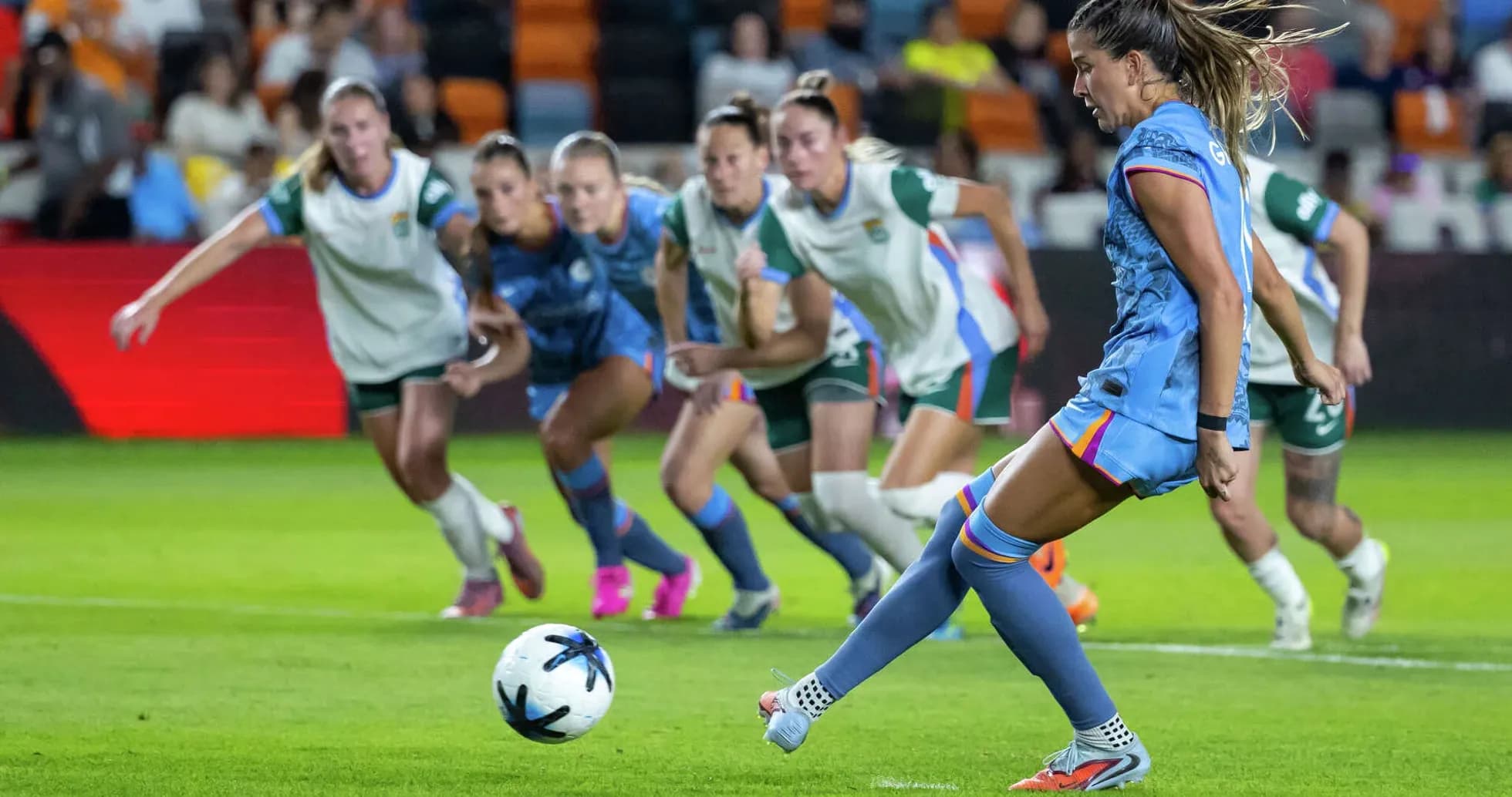 Player taking a penalty kick during match