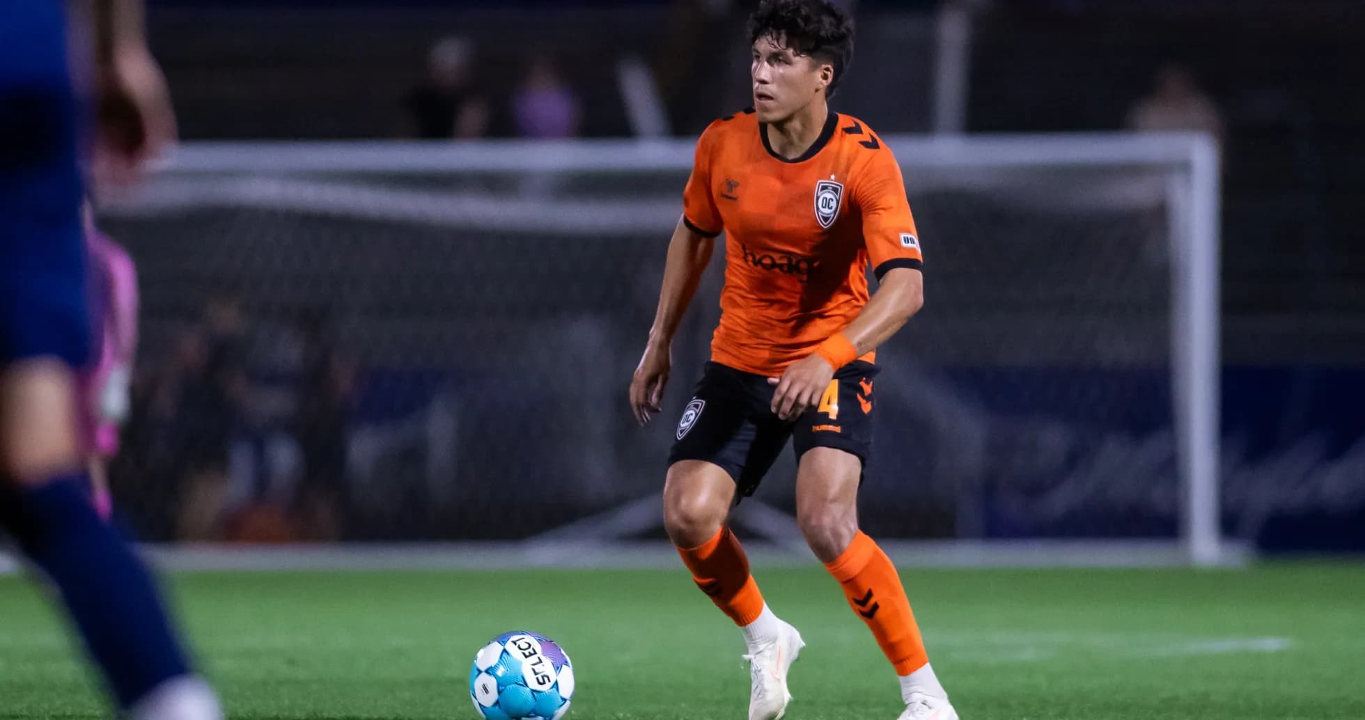 Player in orange jersey during USL Championship match