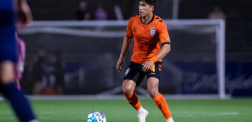 Player in orange jersey during USL Championship match